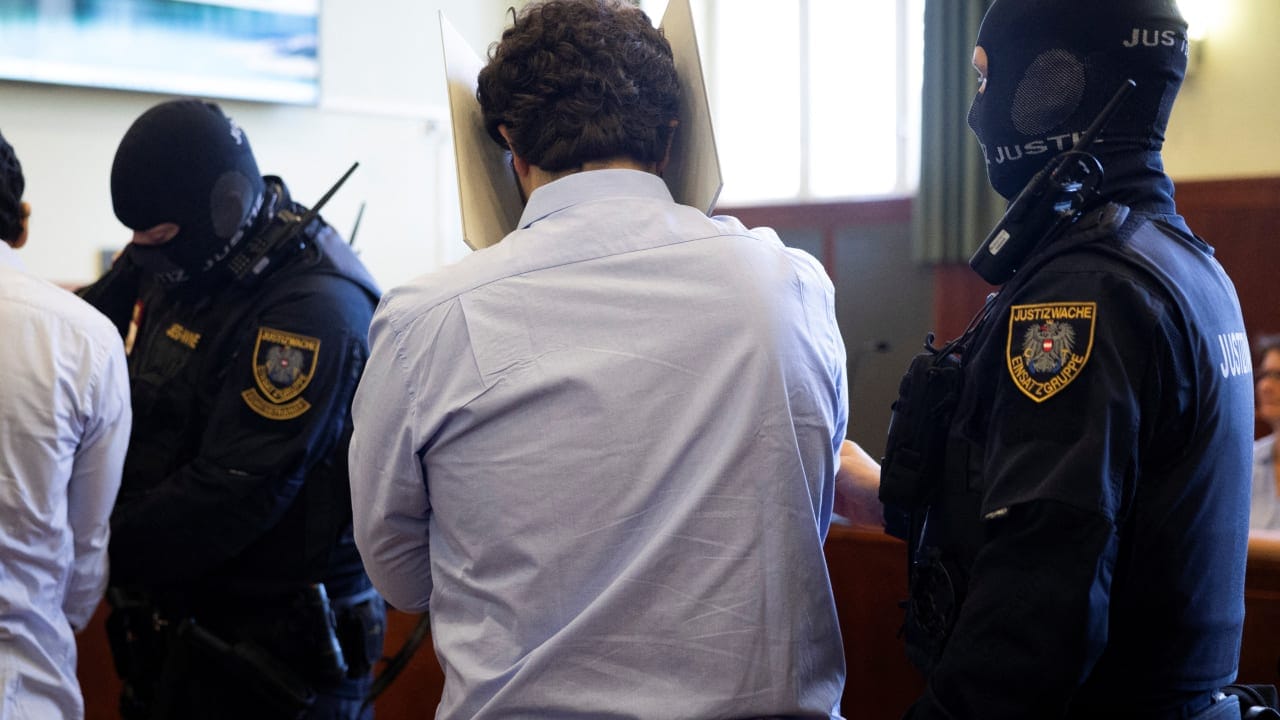 AUSTRIAN DEFENDENT Beran A, who pleaded guilty to planning an attack on US singer Taylor Swift's Vienna concert in 2024, is escorted by security personnel in a courtroom during the last day of his trial in Wiener Neustadt, Austria, May 28, 2026.
