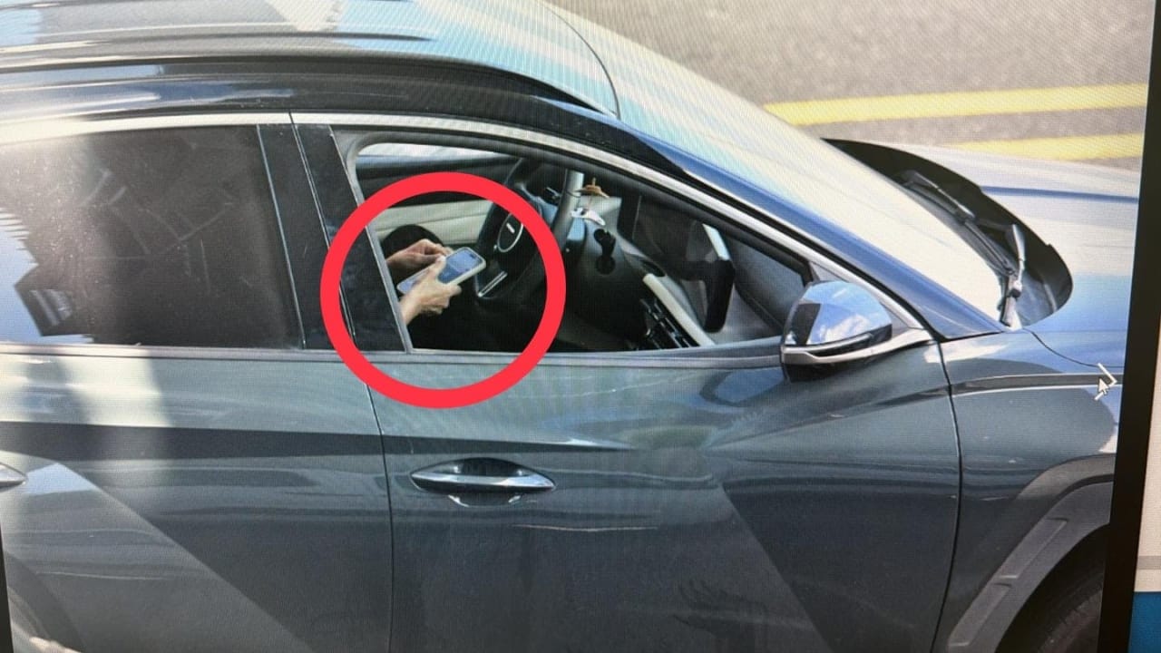 A driver caught using their cellphone while driving during Israel Police’s enforcement campaign aimed at cracking down on traffic offenses across Israel.