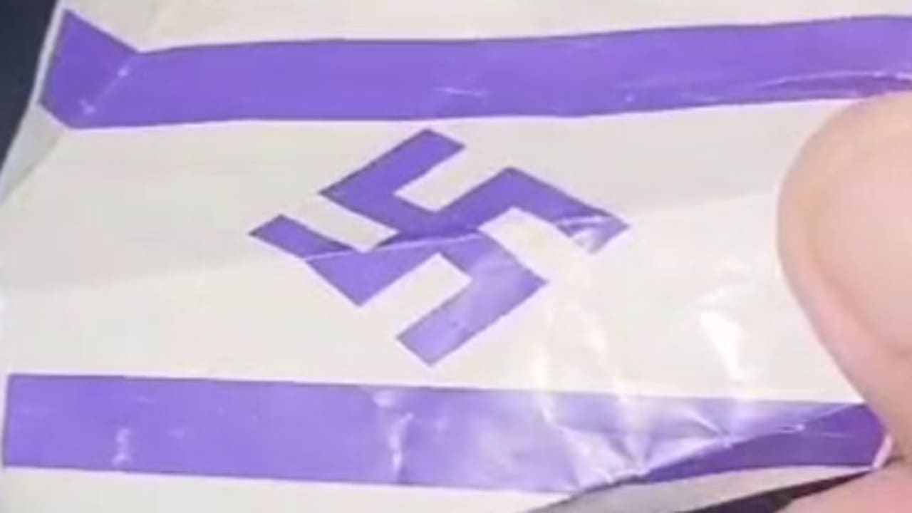 Cards with an Israeli flag with a swastika scattered in and around Justice Solberg's house on June 3, 2026.