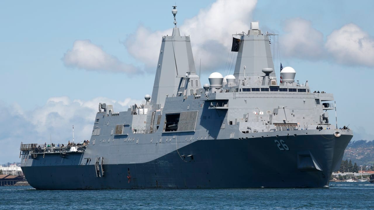 he U.S. Navy amphibious transport dock ship USS John P. Murtha sails through San Diego Bay en route to Naval Base San Diego with the Artemis II mission Orion spacecraft onboard on April 11, 2026 in San Diego, California.