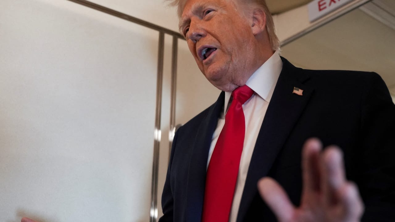 U.S. President Donald Trump speaks to members of the media on board Air Force One while flying from Joint Base Andrews to Chippewa Valley Regional Airport in Eau Claire, Wisconsin, U.S., June 5, 2026. 