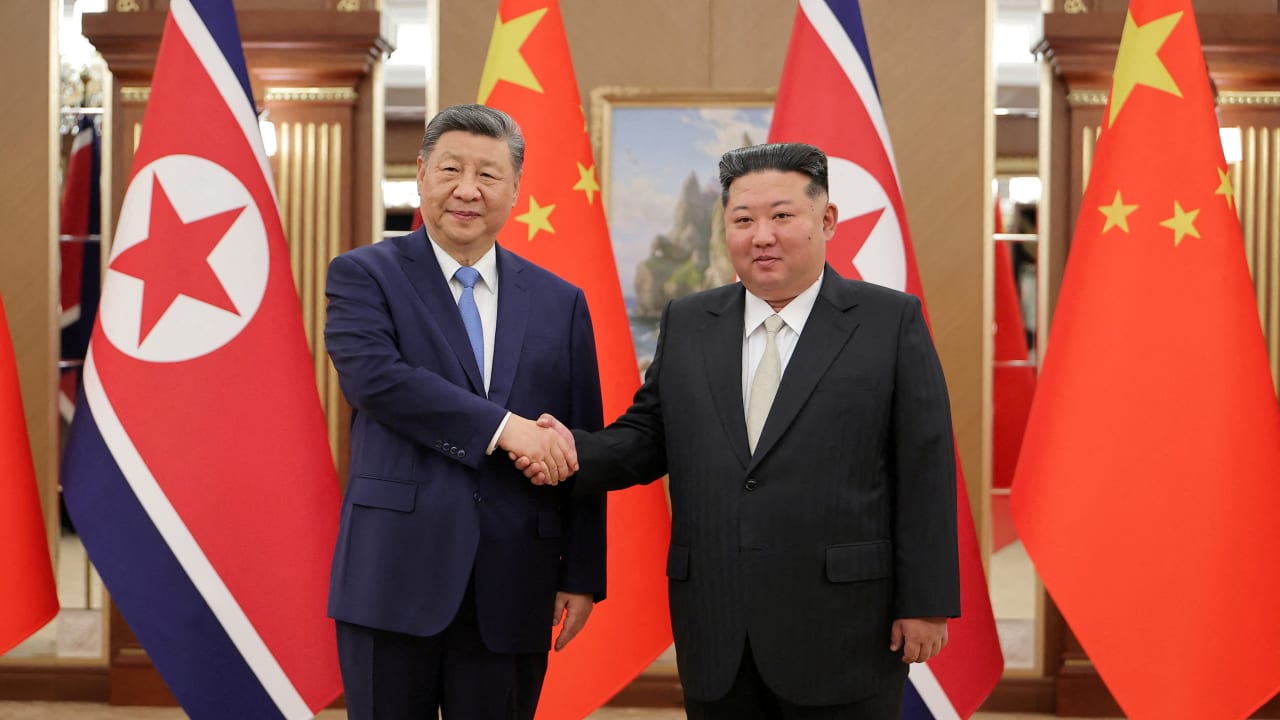 Chinese President Xi Jinping shakes hands with North Korean leader Kim Jong Un during Xi's state visit to Pyongyang, North Korea, June 8, 2026, in this picture released by North Korea's official Korean Central News Agency.