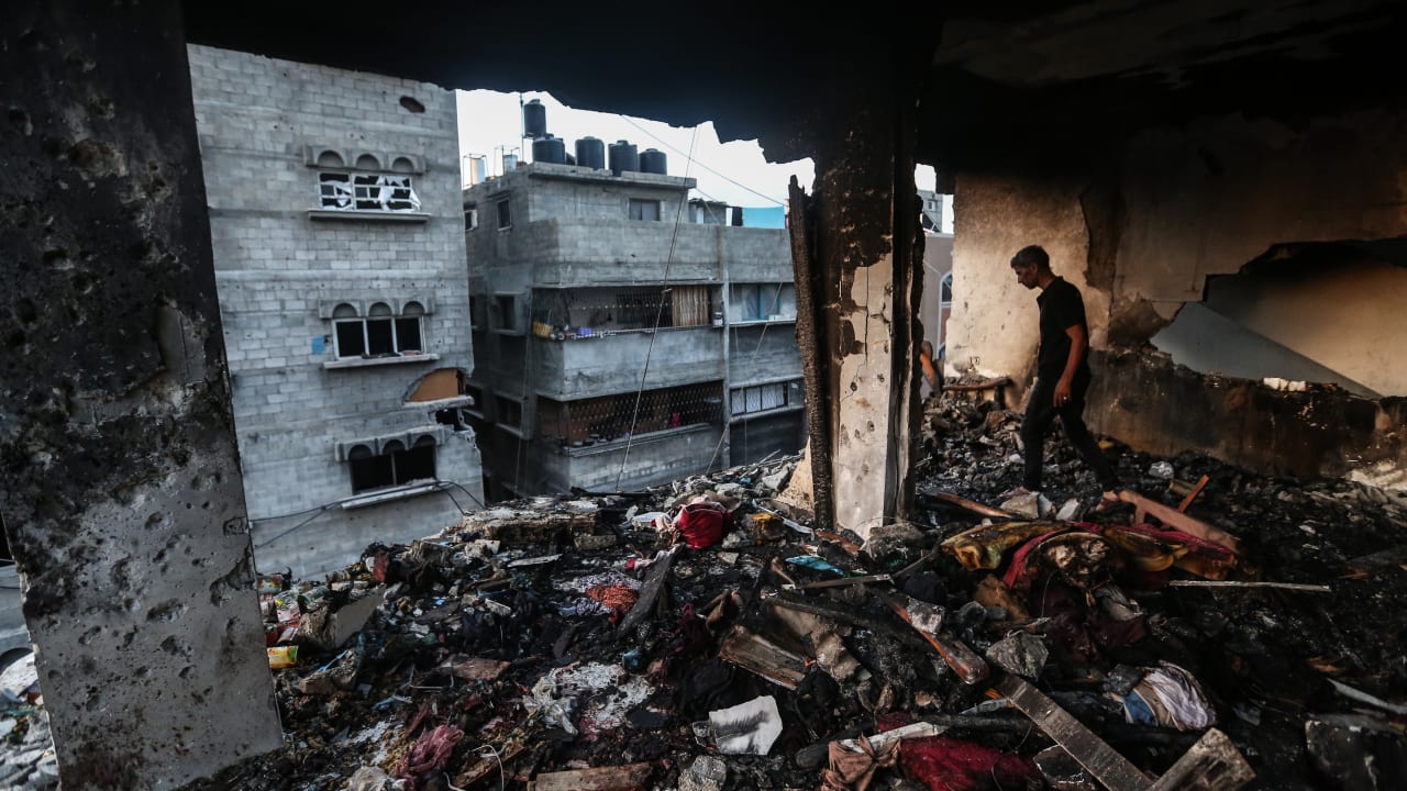 Palestinians inspect damage after alleged Israeli air strikes on apartment buildings on June 4, 2026 in Gaza City, Gaza. 