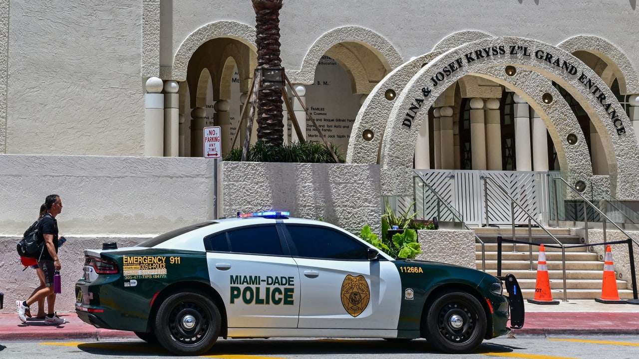A Miami-Dade police car is seen outside the Shul of Bal Harbour synagogue in Surfside, Florida, on May 22, 2025.