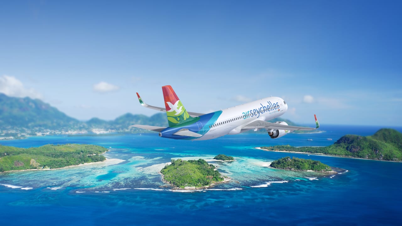 An Air Seychelles Airbus A320, pictured flying over tropical islands; illustrative.