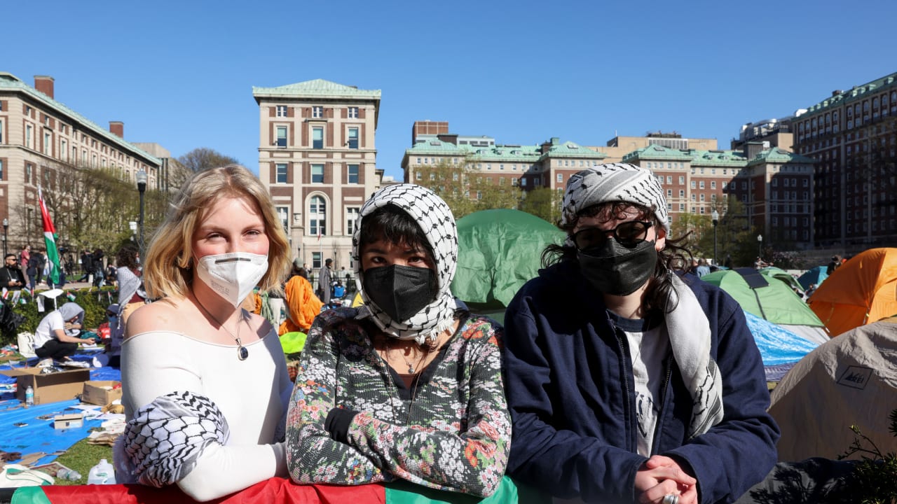 Student protesters stand watch along the perimeter of an encampment supporting Palestinians at the Columbia University campus, during the ongoing conflict between Israel and the Palestinian Islamist group Hamas, in New York City, U.S., April 25, 2024