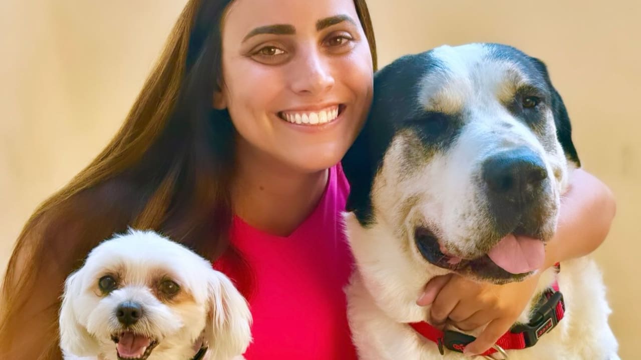 Adopt me Israel's Ela Sayag Lipman and her two adopted rescue dogs, Duda and  Namer.