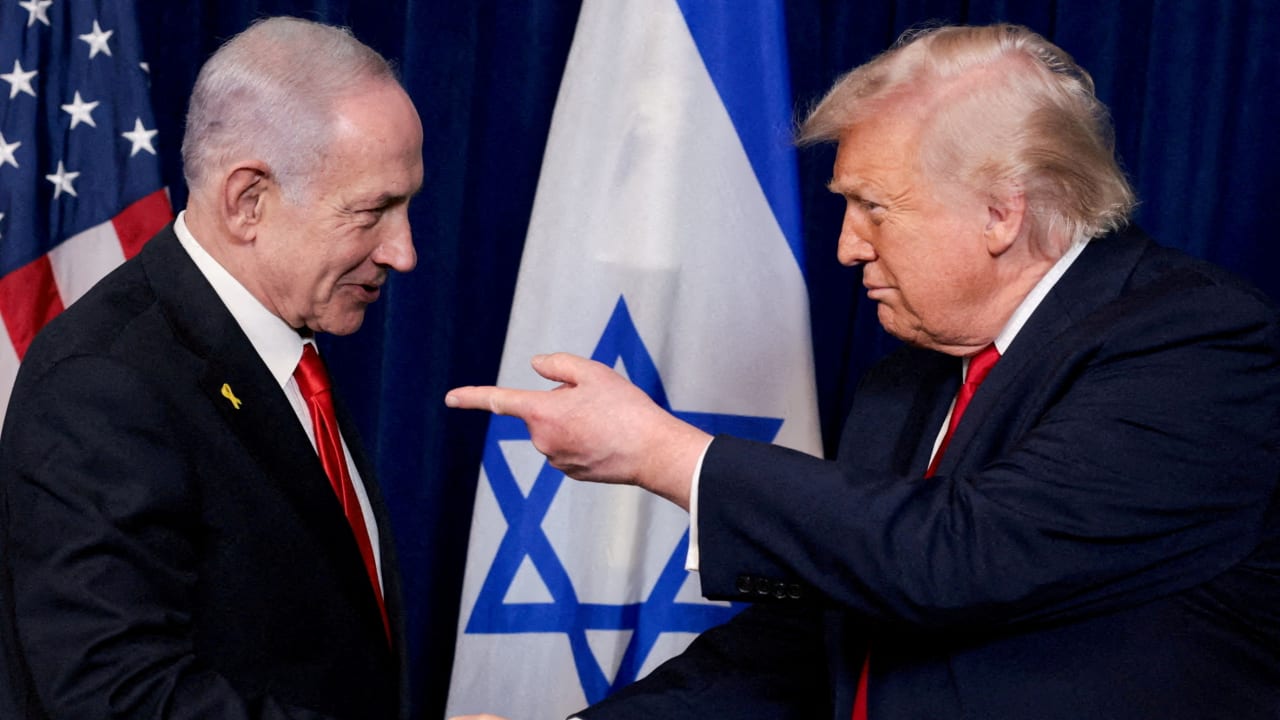 US President Donald Trump points his finger towards Israeli Prime Minister Benjamin Netanyahu as they shake hands during a press conference after meeting at Trump’s Mar-a-Lago club in Palm Beach, Florida.