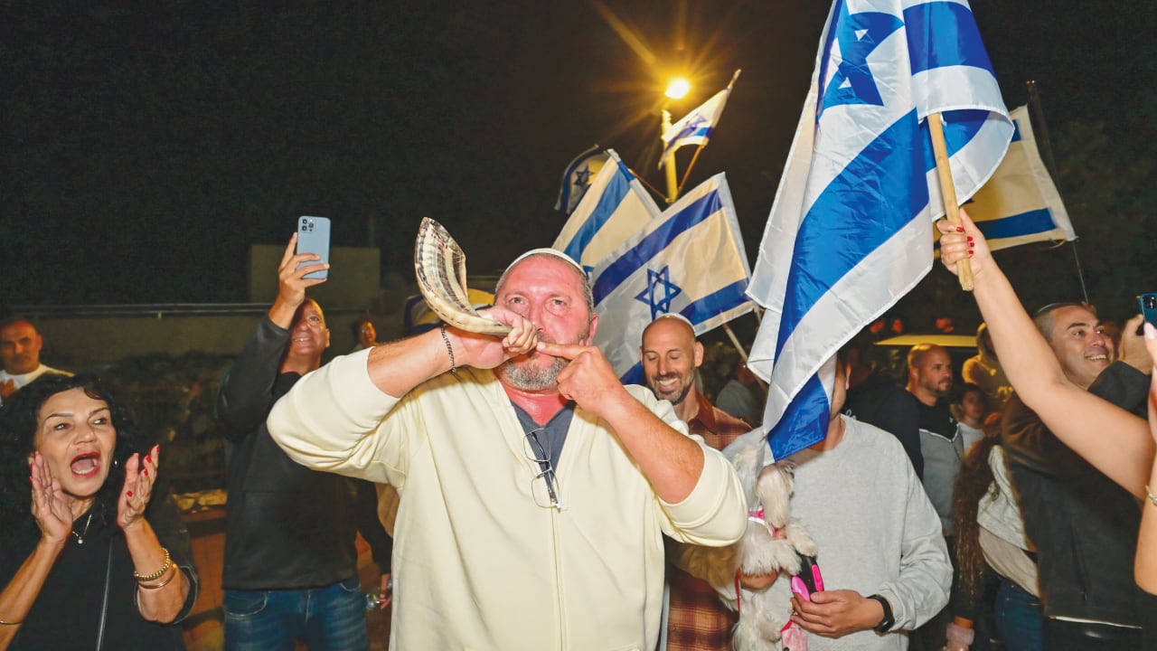 MEASURE OF HOPE: Celebrating freed hostages on Simchat Torah in Moshav Lavon, Oct. 14, 2025.