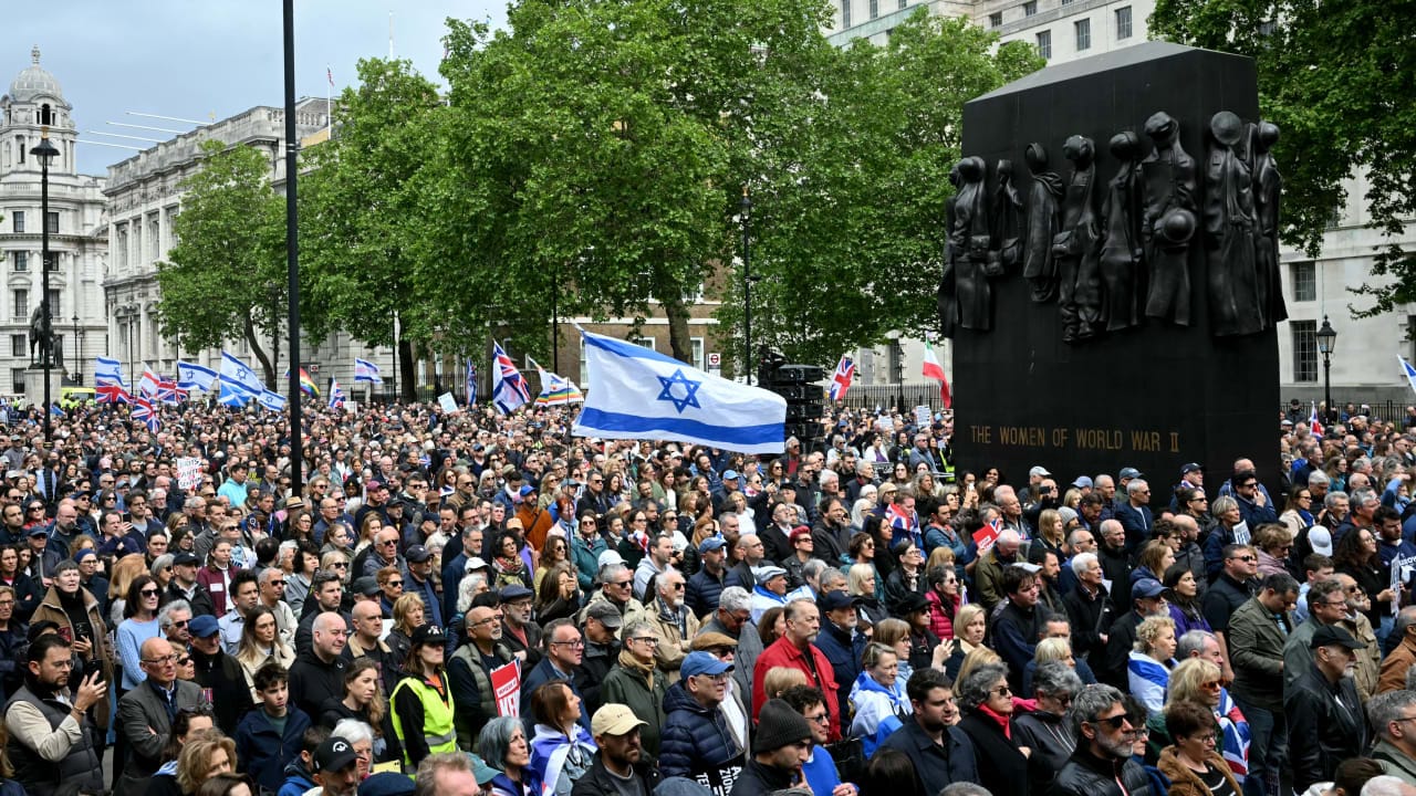Large crowds of people attend a rally organized by the Campaign Against Antisemitism, opposite Downing Street in Central London on May 10. 