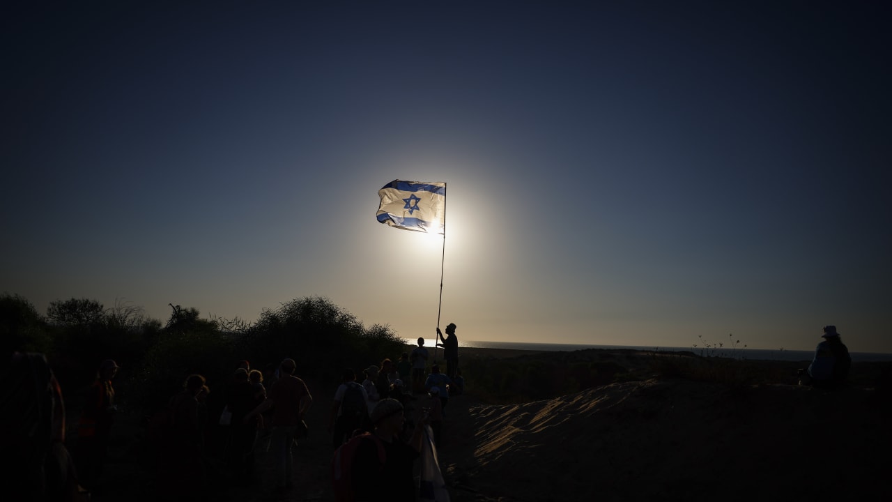 Jews who support the re-establishment of Israeli settlements in the Gaza Strip march near the Israeli border with Gaza, in southern Israel, July 19, 2026