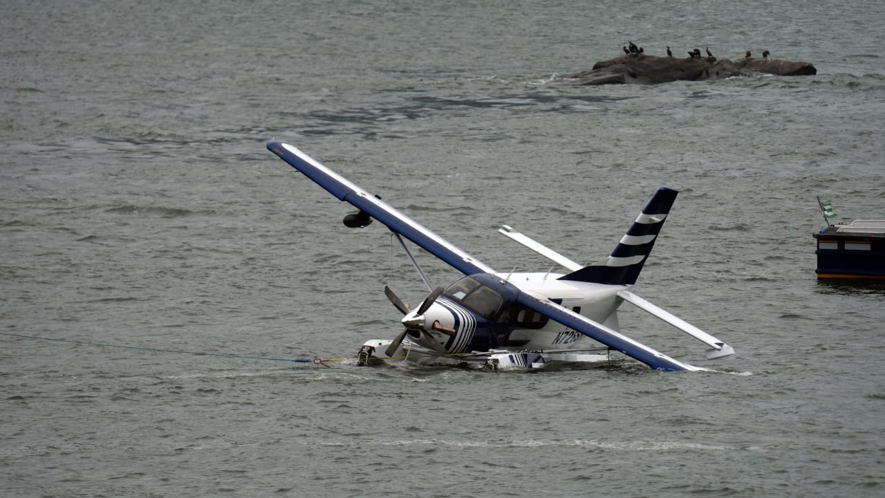  Emergency services respond to a crashed seaplane in the East River on July 5, 2026.