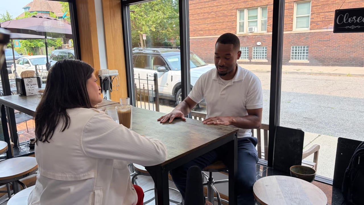 US Rep. Haley Stevens (l), candidate for the Democratic Senate nomination in Michigan, discusses Israel with Jai Singletary, director of a Detroit neighborhood improvement association, in Detroit, Michigan, July 27, 2026.