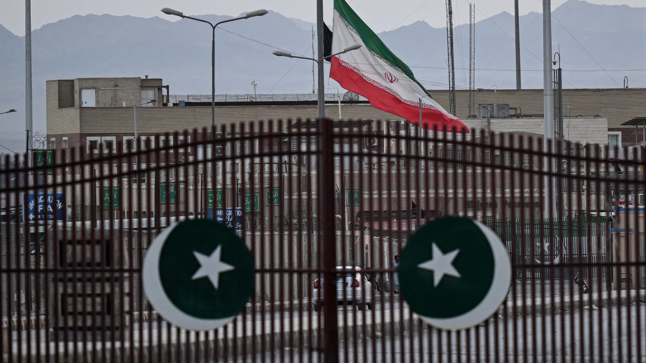 An Iranian flag flies at half-mast at the Pakistan-Iran border crossing at Taftan, Balochistan province on March 1, 2026 after the death of Iran's supreme leader Ayatollah Ali Khamenei amid US-Israel strikes; Illustrative.