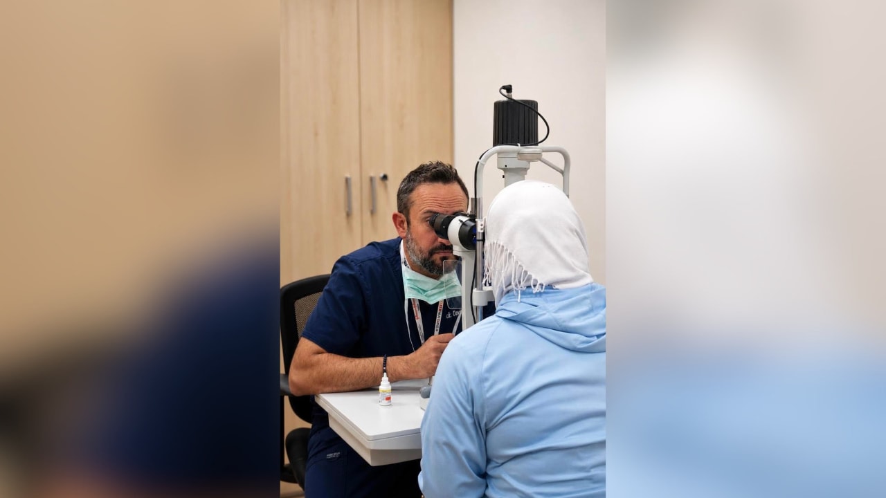 Doctor examines patient at Hadassah Medical Center.