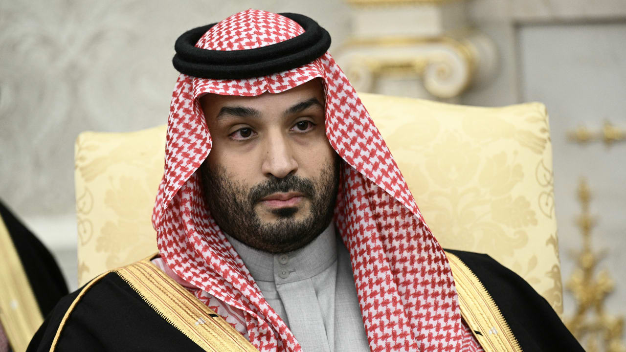Crown Prince and Prime Minister of the Kingdom of Saudi Arabia Mohammed bin Salman looks on during a meeting with US President Donald Trump (not pictured) in the Oval Office of the White House in Washington, DC on November 18, 2025; illustrative