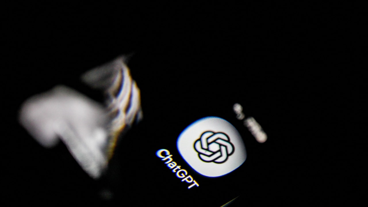Picture showing the ChatGPT application displayed on a smartphone screen, illustrative