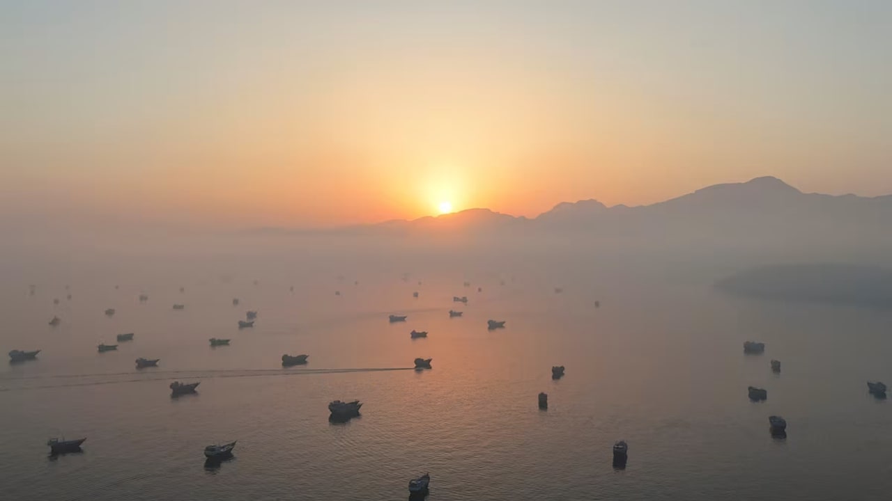 A drone view shows vessels in the Strait of Hormuz, as seen from Musandam, Oman, June 15, 2026.
