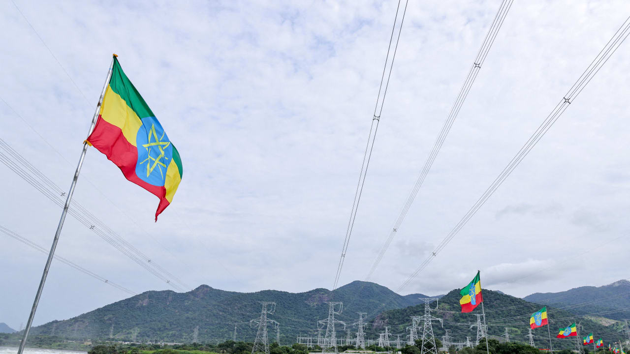 Ethiopian flags flutter in the wind next to a power station at the Grand Ethiopian Renaissance Dam (GERD), built along the Blue Nile, during its inauguration, in Guba, Benishangul-Gumuz region, Ethiopia, September 9, 2025.
