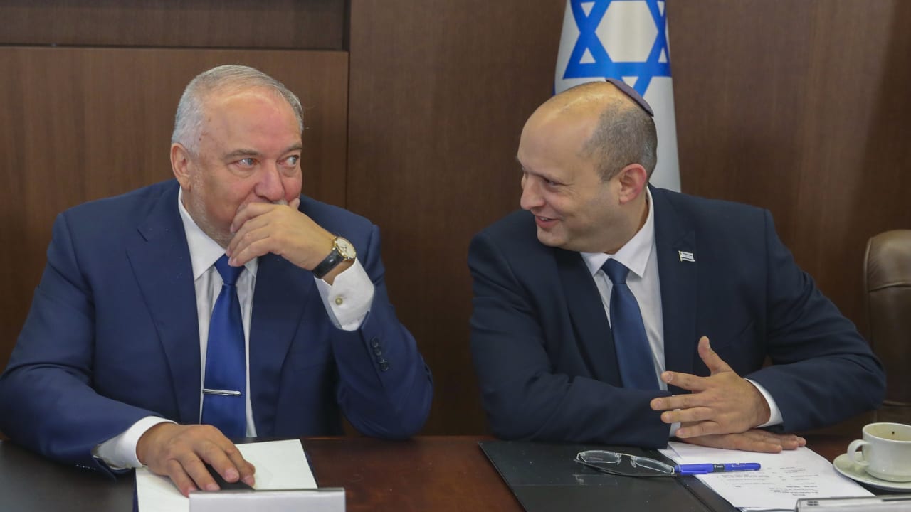 Then-deputy prime minister Naftali Bennett and then-finance minister Avigdor Liberman attend a cabinet meeting at the Prime Minister's Office, in Jerusalem, July 3, 2022