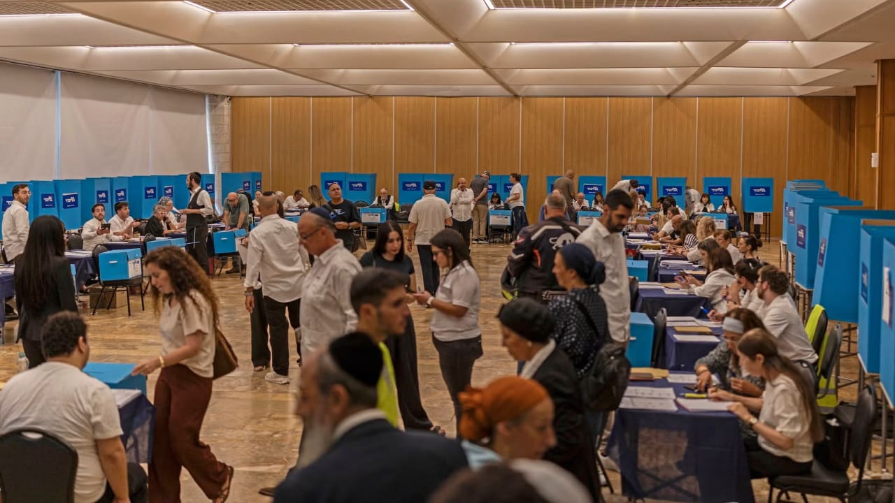 Members of the Likud party gather at a polling station for the primary elections of their party ahead of the country’s national elections, in Jerusalem on August 17, 2026.
