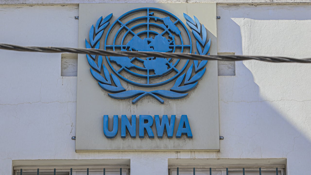 The UNRWA emblem is displayed on a building at the Kalandia Training Center in Qalandia refugee camp, West Bank, on August 25, 2026.