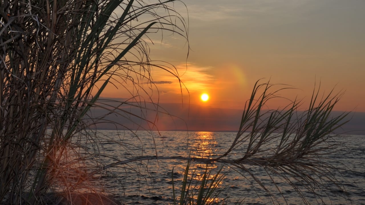 Sun over the Lake Niassa Reserve.