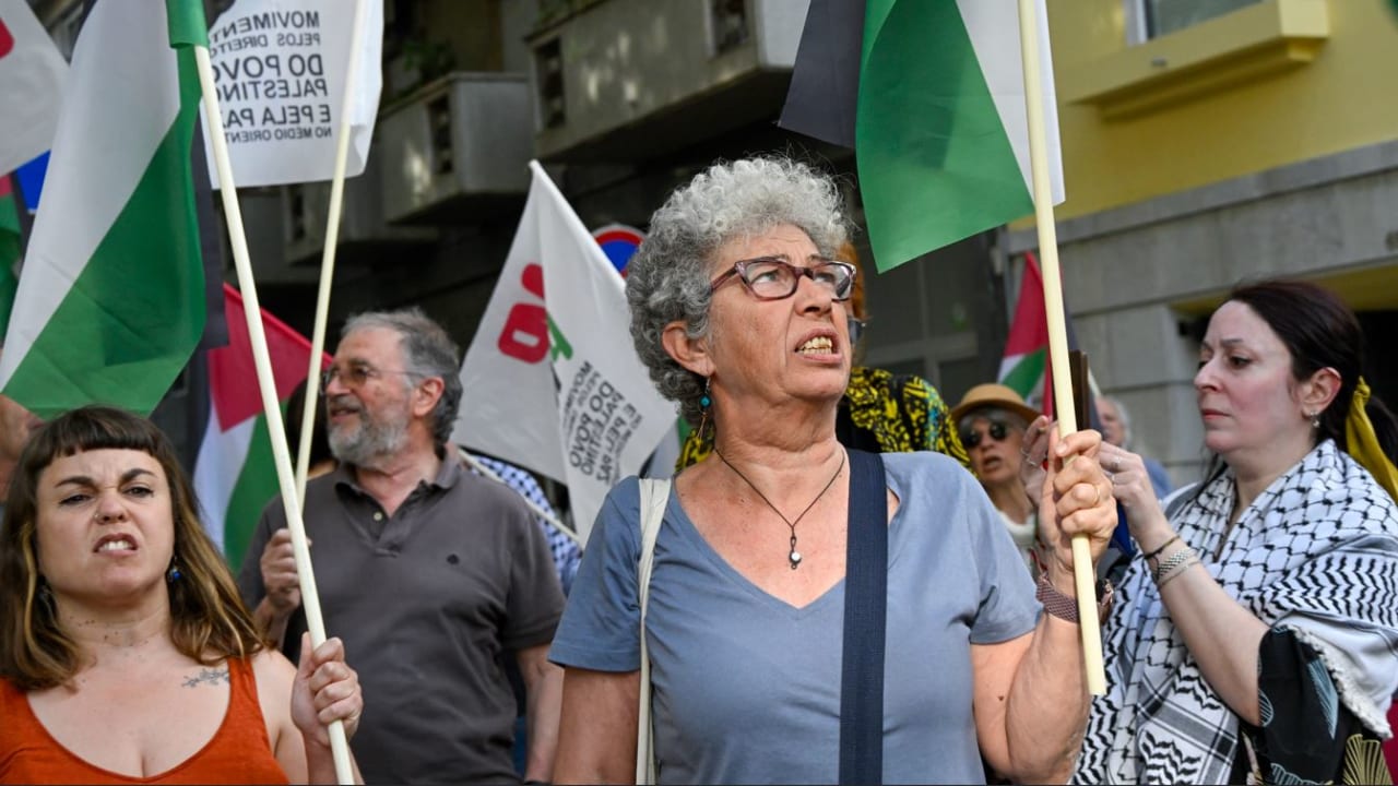 Demonstrators wave Palestinian flags and chant against Israel’s and America’s war with Iran in front of the Israeli embassy in Portugal in May. 