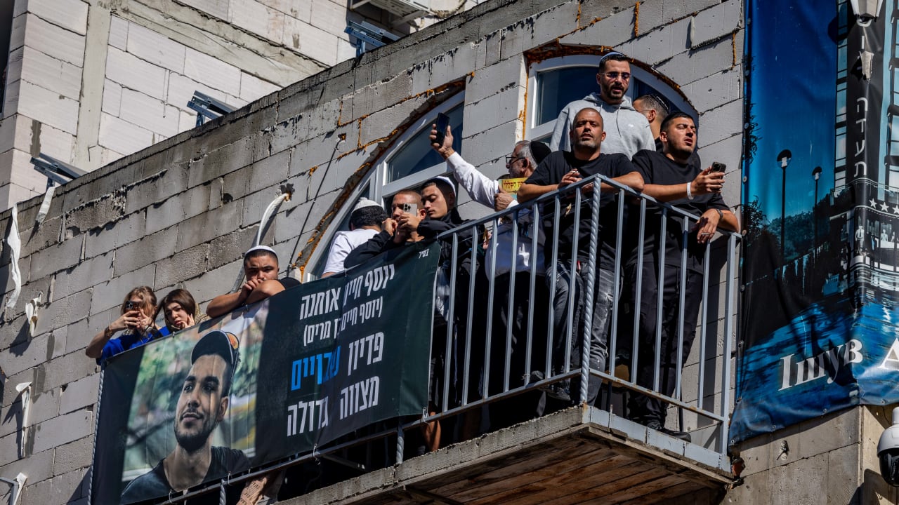 Jewish men in the street during Tikkun HaKlali near the tomb of Rabbi Nachman of Breslov in Uman, on eve of the Jewish holiday of Rosh Hashanah, September 22, 2025. 