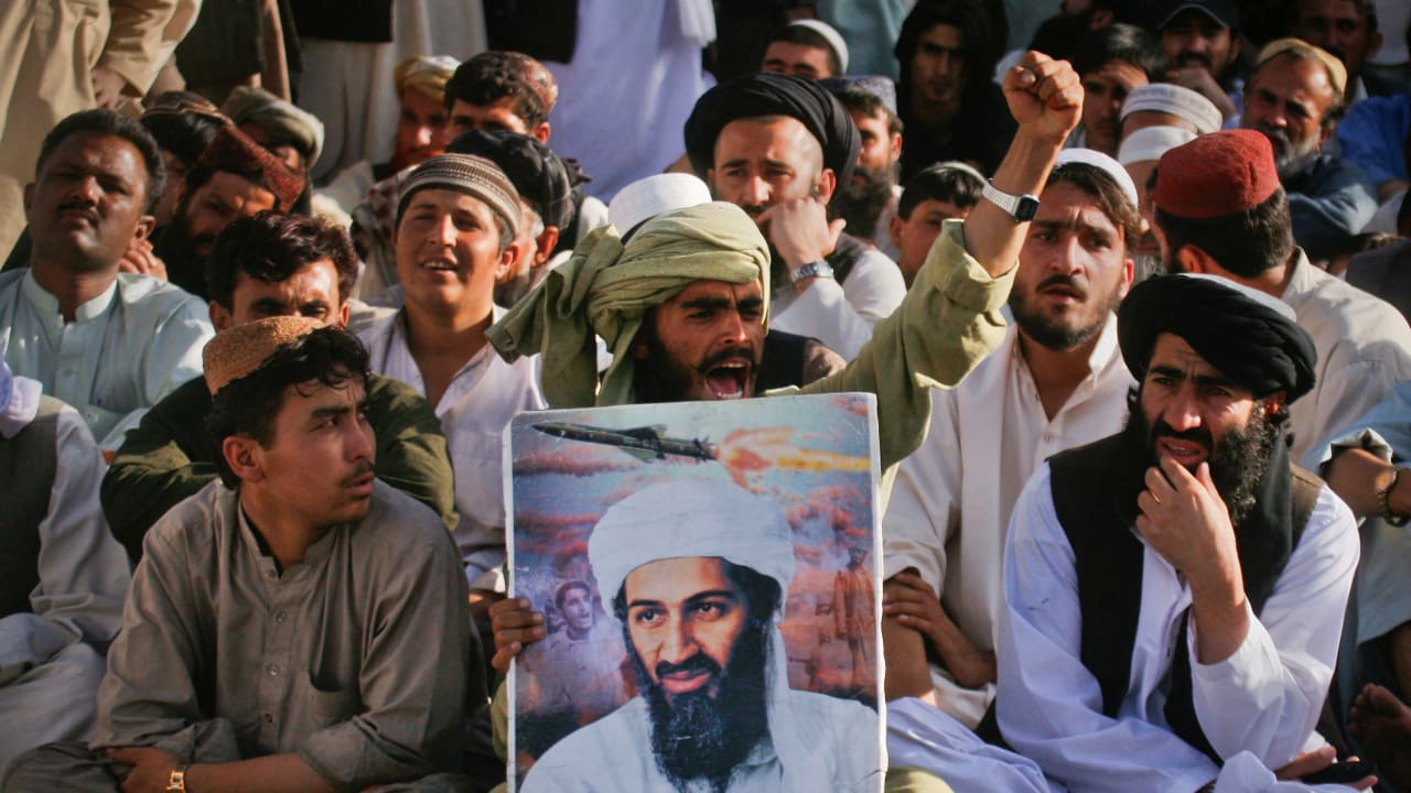 Supporters of al-Qaeda leader Osama bin Laden shout anti-American slogans, after the news of his death, during a rally in Quetta May 2, 2011. 