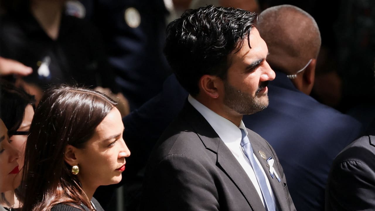 New York City Mayor Zohran Mamdani and U.S. Rep. Alexandria Ocasio-Cortez (D-N.Y) listen as the names of victims are read during a ceremony marking the 25th anniversary of the September 11, 2001 attacks on the World Trade Center at the 9/11 Memorial, in New York City, U.S., September 11, 2026.