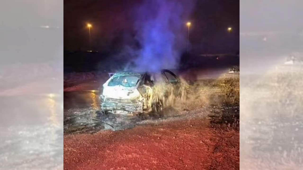 Burned vehicle is seen after authorities discovered three bodies inside it on September 13, 2026 near Jatt, in northern Israel.