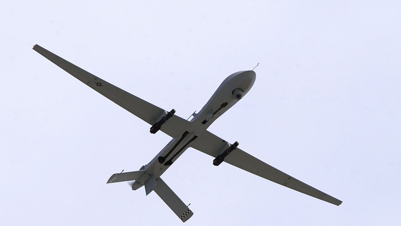 A US Air Force MQ-1 Predator, unmanned aerial vehicle, armed with AGM-114 Hellfire missiles, performs a low altitude pass during the Aviation Nation 2005 air show at Nellis Air Force Base, Nevada in this November 13, 2005 USAF handout photo obtained by Reuters February 6, 2013.