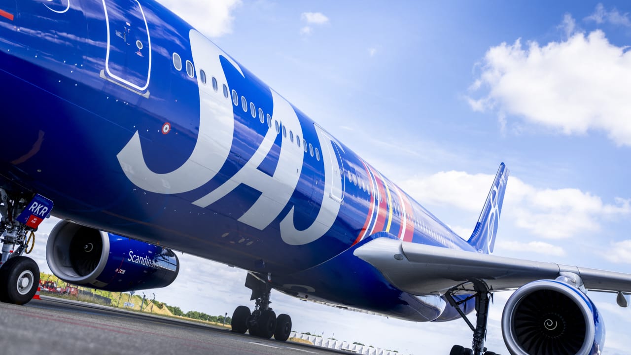 The logo of SAS Scandinavian Airlines is seen on anAirbus A330 plane during a SAS press conference at Copenhagen Airport in Copenhagen on June 30, 2026.