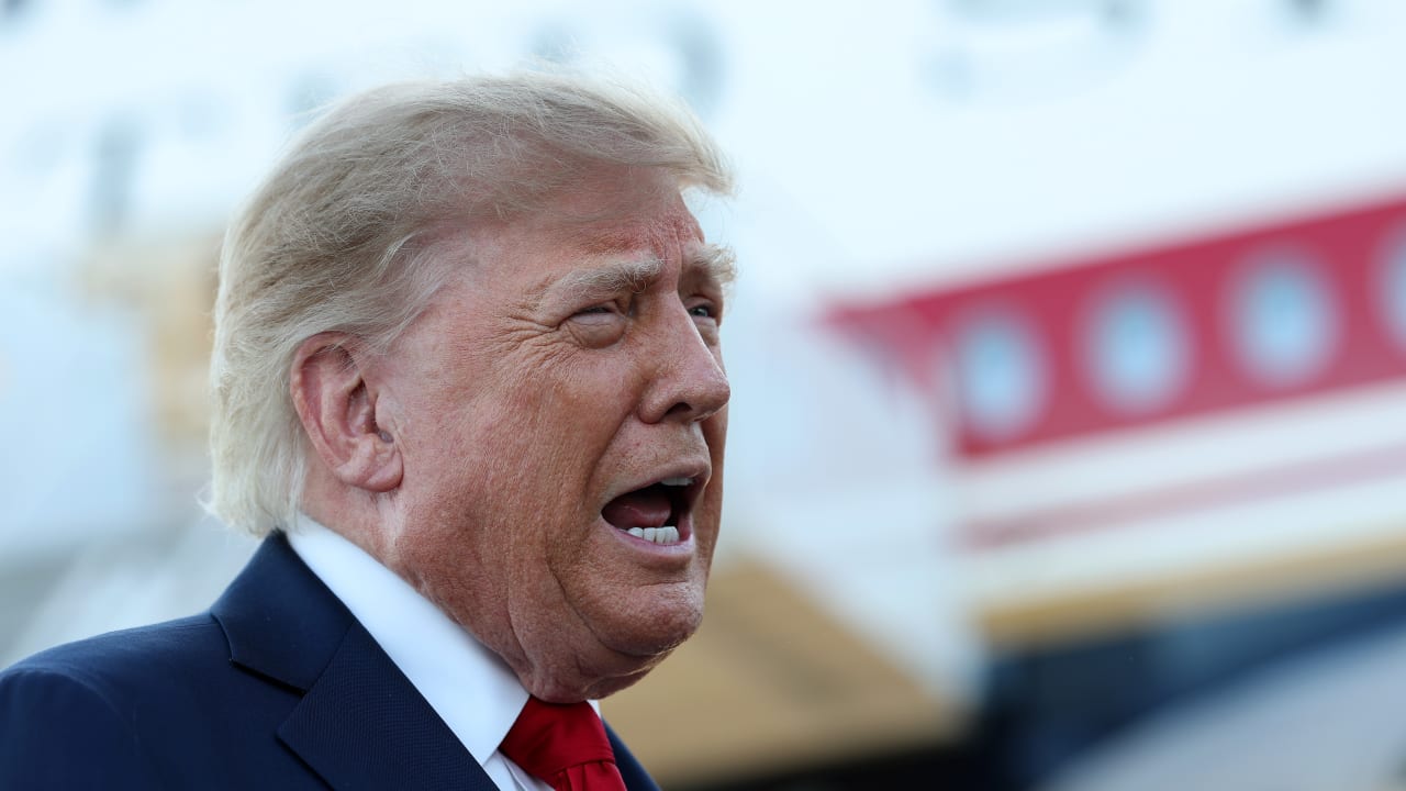 US President Donald Trump talks with members of the media after walking off Air Force One at the Charlotte Douglas International Airport on September 16, 2026 in Charlotte, North Carolina.