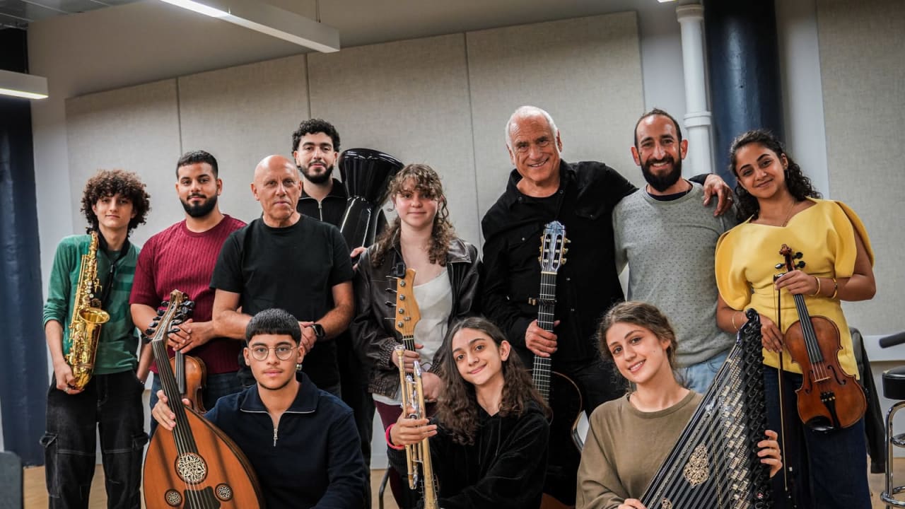 David Broza with Maestro Tom Cohen and TYO Youth-Galilee musicians.