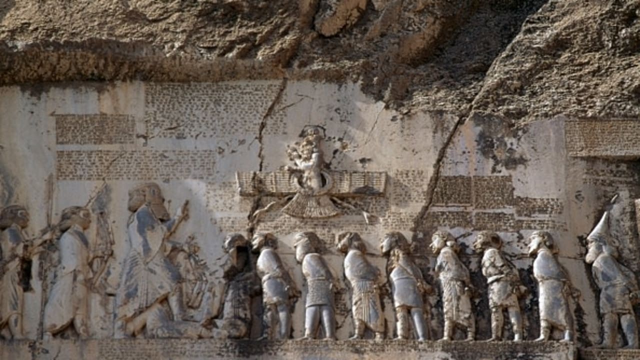  Relief depicting the victory of Darius I over magus Gaumata with inscriptions in three languages, ancient Persian, Elamite and Babylonian, Bisotun (UNESCO World Heritage List, 2006), Iran. 