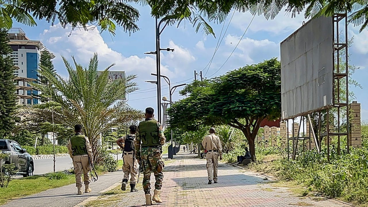 Members of the Tigray People's Liberation Front (TPLF) walk along a main road in Mekelle on September 23, 2026, as tensions intensify in northern Ethiopia after Tigrayan rebels seized control of airports in the region.
