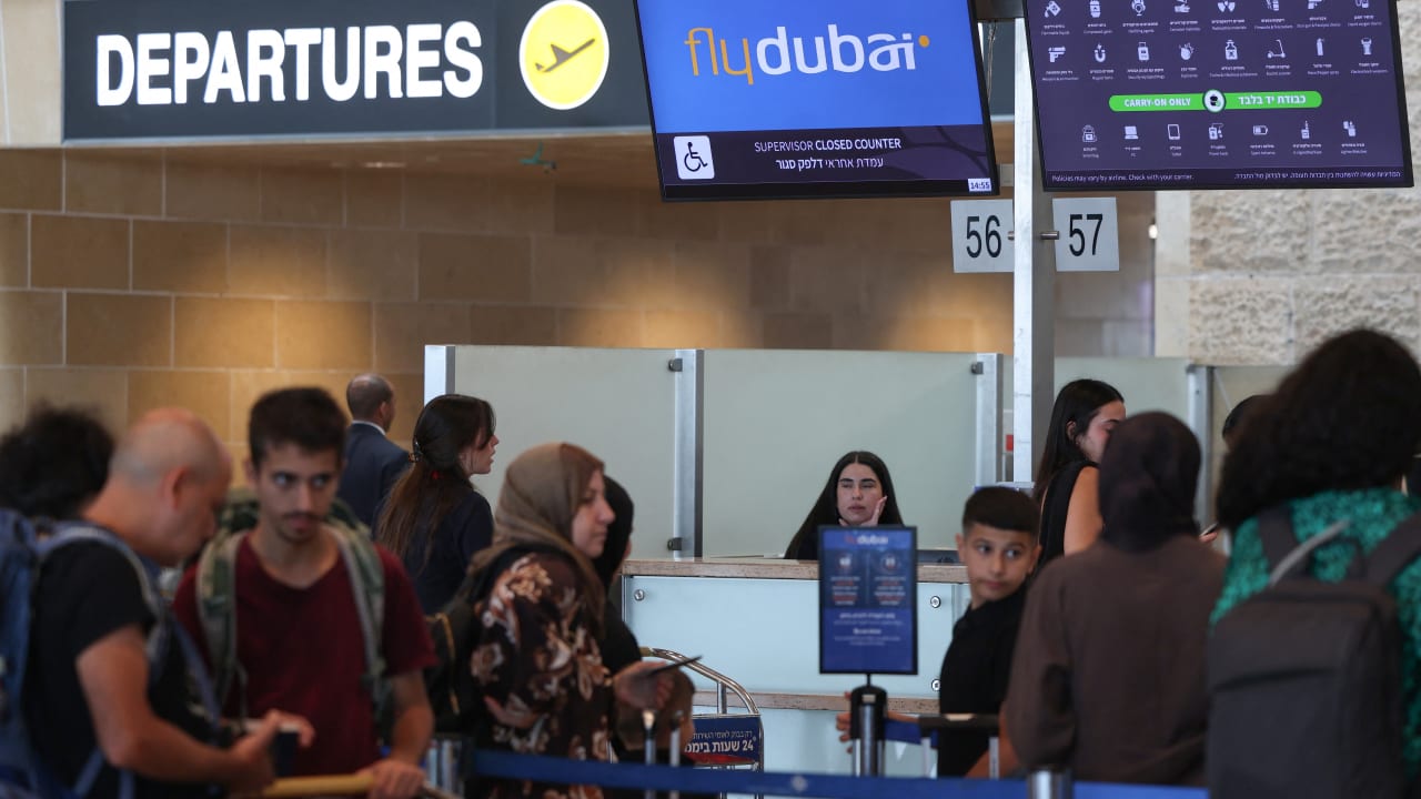 Passengers queue at the flydubai counters in Ben Gurion Airport near Tel Aviv on September 30, 2026.