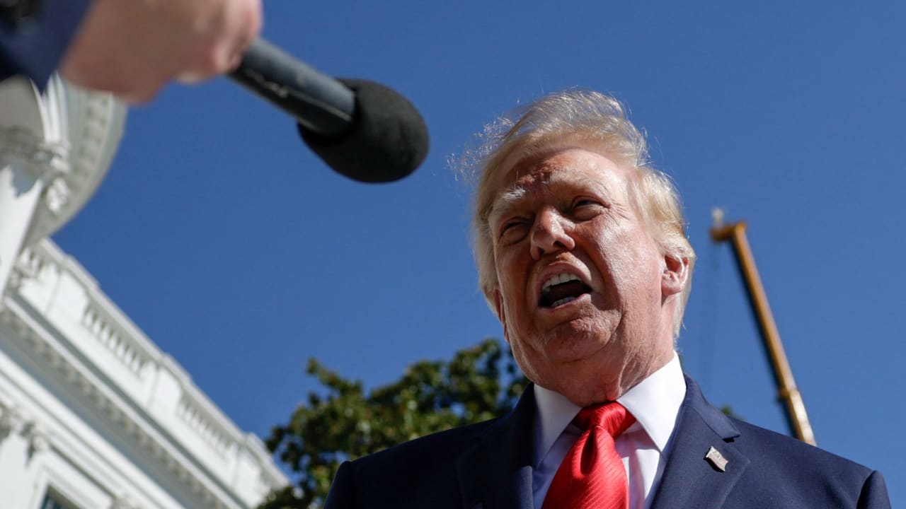US President Donald Trump speaks to reporters before boarding Marine One as he departs for Denton, Texas, on the South Lawn of the White House in Washington, US, October 1, 2026.