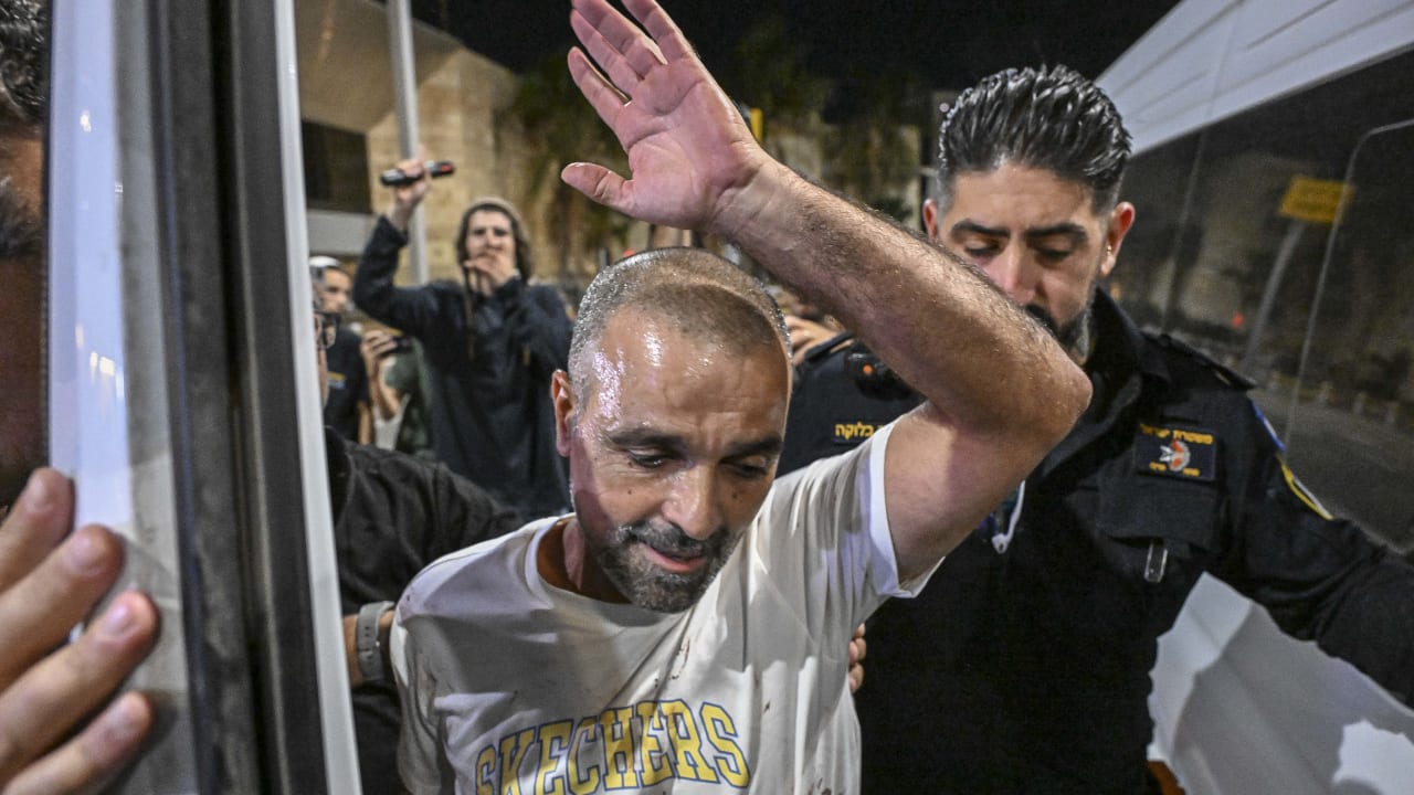 Yaniv Hayun, who subdued the suspected terrorist aboard Flydubai flight FZ1073, arrives at Ben Gurion International Airport near Tel Aviv, September 30, 2026. 