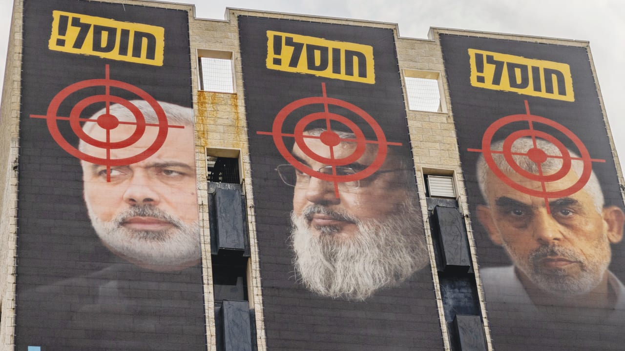 ELIMINATED BY the IDF post-Oct. 7: Hamas leaders Ismail Haniyeh (L) and Yahya Sinwar (R), and Hezbollah leader Hassan Nasrallah (C), seen at entrance to Jerusalem, Nov. 2024. 