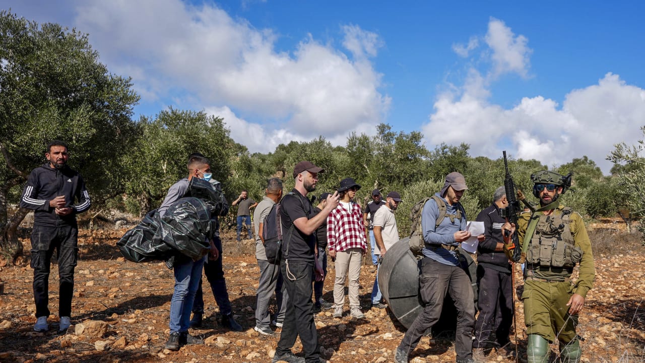 Israeli security forces remove Palestinians and left-wing activists from olive groves during the olive harvest season in the West Bank village of Beita, near Nablus, October 2, 2026