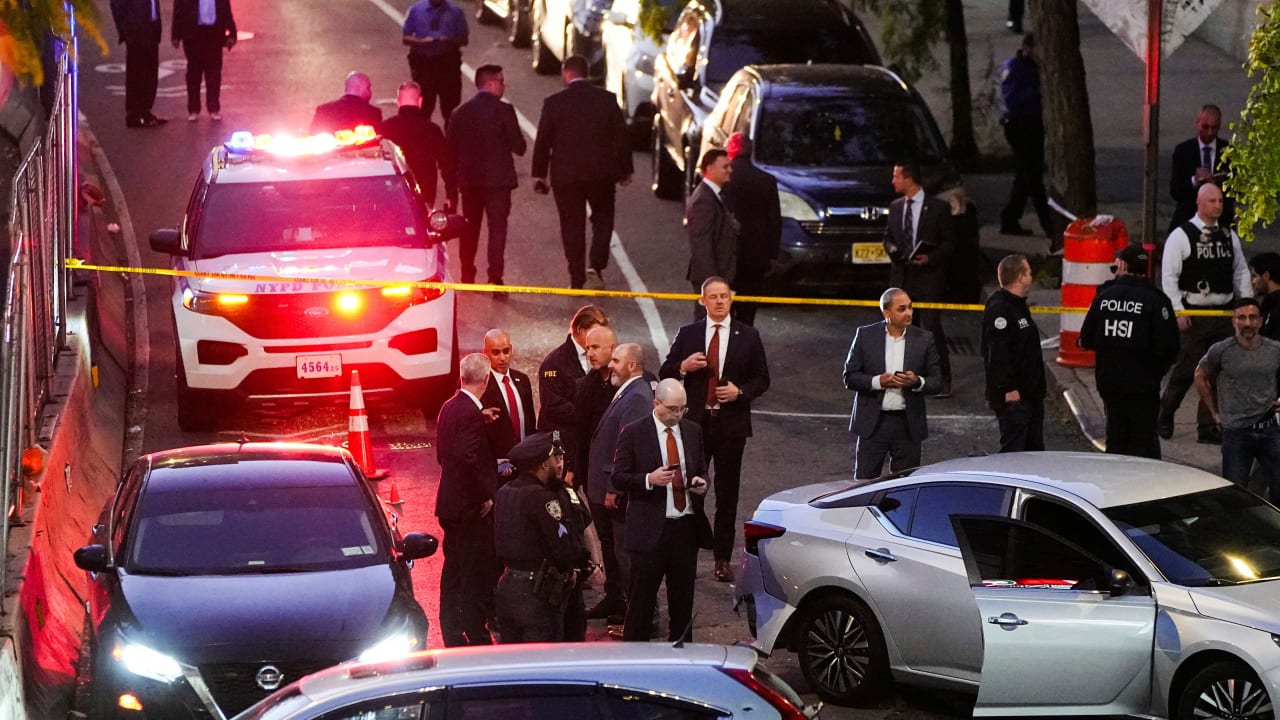 Law enforcement work at the scene after a shooting reportedly involving US Immigration and Customs Enforcement (ICE) officers in the Bronx borough of New York City, US, October 8, 2026.