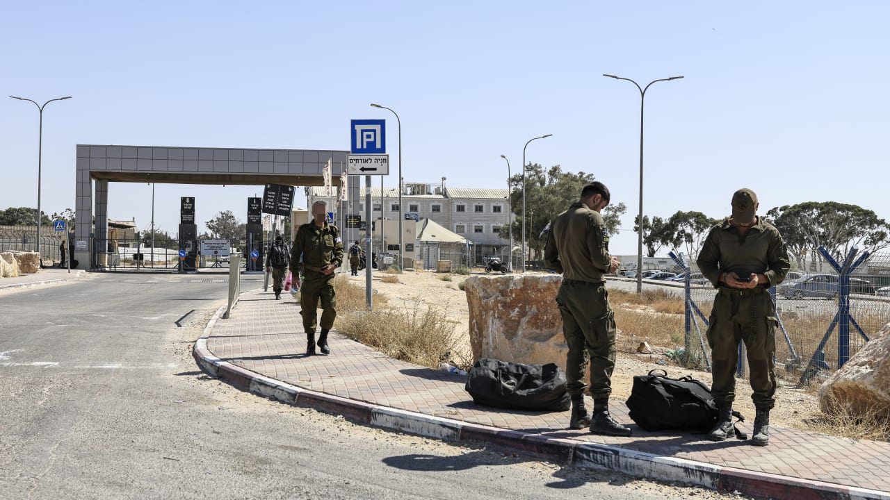 Israeli soldiers are seen outside the Sde Teiman military base near Beersheba, southern Israel, July 30, 2026. 