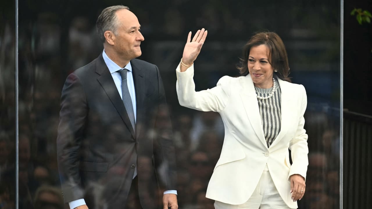 Former US vice president Kamala Harris and her husband Doug Emhoff arrive at the opening day of the Barack Obama Presidential Center in Chicago, Illinois, on June 18, 2026.
