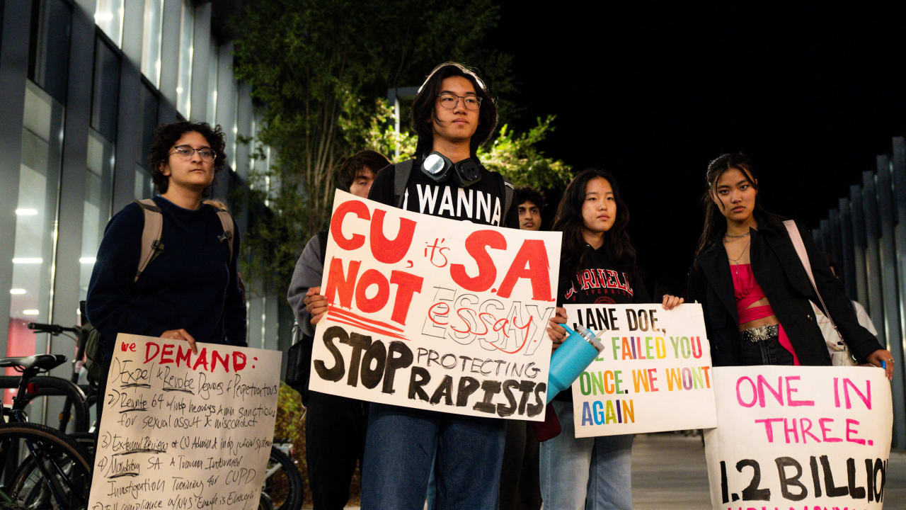 Cornell University students holds signs after a seven-hour-long sit-in protest representing the seven hours that a Jane Doe alleges she was sexually assaulted in a case involving seven members of Cornell’s Chi Phi fraternity, in Ithaca, New York, US, October 7, 2026.