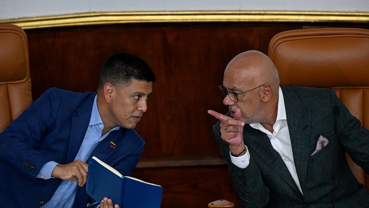 Venezuela's National Assembly President Jorge Rodriguez (R) talks to First Vice President Pedro Infante during a session of the National Assembly in Caracas on September 23, 2026.