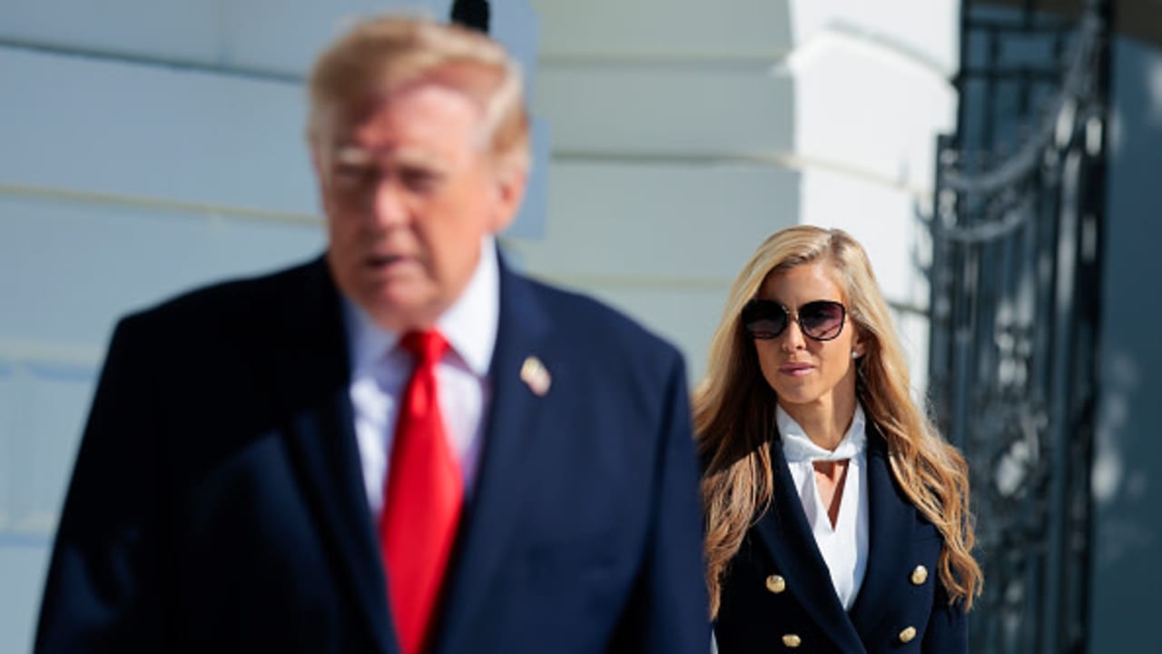 White House Press Secretary Katie Zacharia (R) joins US President Donald Trump as he departs on the South Lawn of the White House on October 13, 2026 in Washington, DC. 