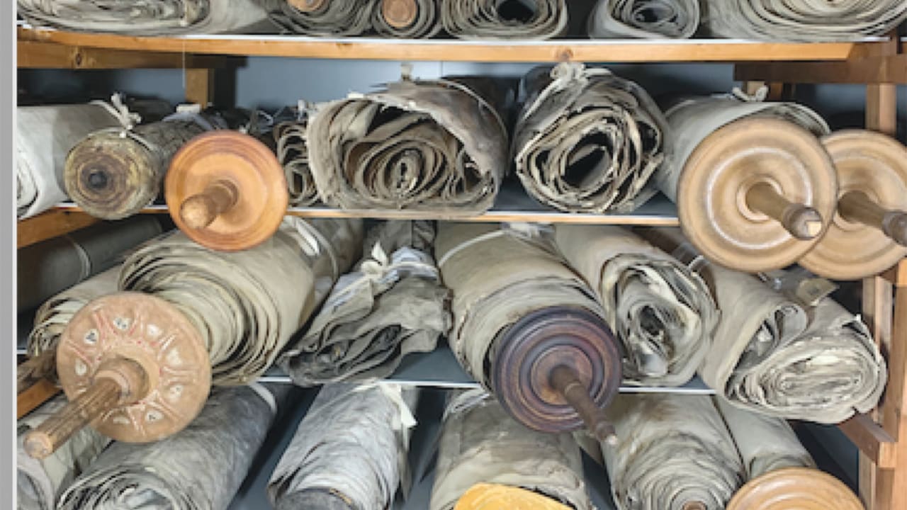 On Febuary 7, 1964, two enormous trucks carrying the 1,800 stained and tightly packed scrolls arrived in London...